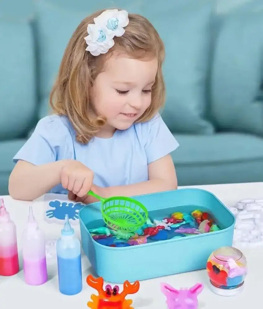 مجموعة ألعاب مائية سحرية ثلاثية الأبعاد بأربعة ألوان وأربعة أشكال مع زجاجة بلاستيكية وجِل لعب بتصميم مستوحى من الحياة البحرية - Sooqja سوقجة