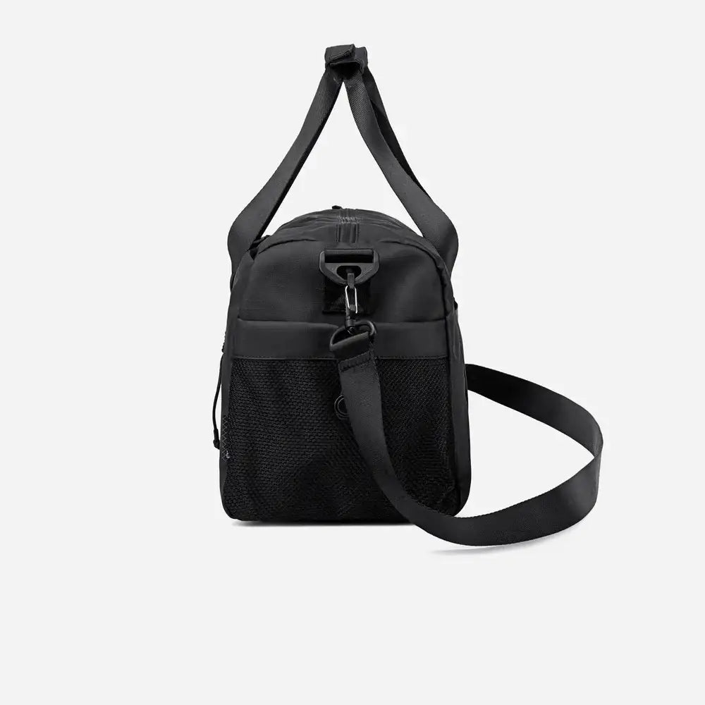 حقيبة رياضية فاخرة مقاومة للماء بسعة 25 لترًا مع حجرة للأحذية وأشرطة قابلة للفصل للرجال والنساء - Arctic Hunter LX00537 / Premium 25L Water-Resistant Gym Bag with Shoe Compartment and Detachable Straps for Men and Women - Arctic Hunter LX00537 - Sooqja سوقجة