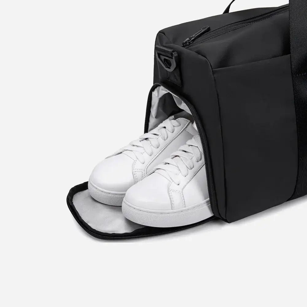 حقيبة رياضية فاخرة مقاومة للماء بسعة 25 لترًا مع حجرة للأحذية وأشرطة قابلة للفصل للرجال والنساء - Arctic Hunter LX00537 / Premium 25L Water-Resistant Gym Bag with Shoe Compartment and Detachable Straps for Men and Women - Arctic Hunter LX00537 - Sooqja سوقجة