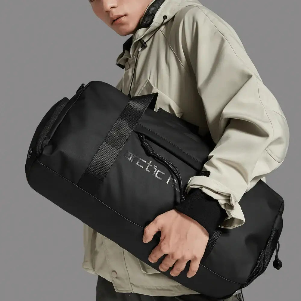 حقيبة رياضية فاخرة مقاومة للماء بسعة 25 لترًا مع حجرة للأحذية وأشرطة قابلة للفصل للرجال والنساء - Arctic Hunter LX00537 / Premium 25L Water-Resistant Gym Bag with Shoe Compartment and Detachable Straps for Men and Women - Arctic Hunter LX00537 - Sooqja سوقجة