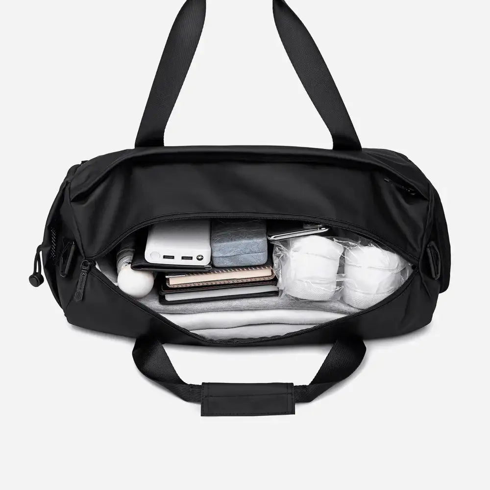 حقيبة رياضية فاخرة مقاومة للماء بسعة 25 لترًا مع حجرة للأحذية وأشرطة قابلة للفصل للرجال والنساء - Arctic Hunter LX00537 / Premium 25L Water-Resistant Gym Bag with Shoe Compartment and Detachable Straps for Men and Women - Arctic Hunter LX00537 - Sooqja سوقجة